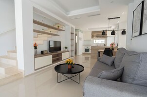 Superior Duplex | Living area | 50-inch Smart TV with digital channels, Netflix, heated floors