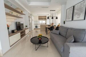Superior Duplex | Living area | 50-inch Smart TV with digital channels, Netflix, heated floors