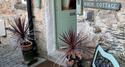 Cosy Lakeland Cottage with jacuzzi bath, log fires and a 4 poster bed.