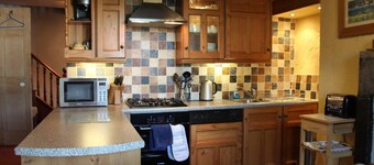 Cosy Lakeland Cottage with jacuzzi bath, log fires and a 4 poster bed.