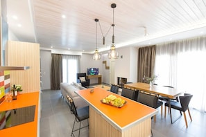 Villa | Private kitchen | Fridge, microwave, oven, stovetop
