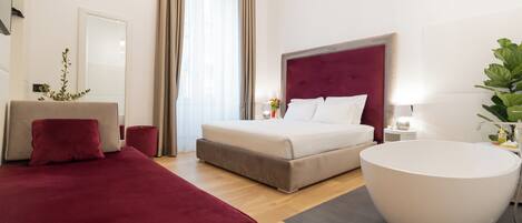 Suíte luxo, vista para a cidade | Frigobar (abastecido com itens grátis), cofres nos quartos