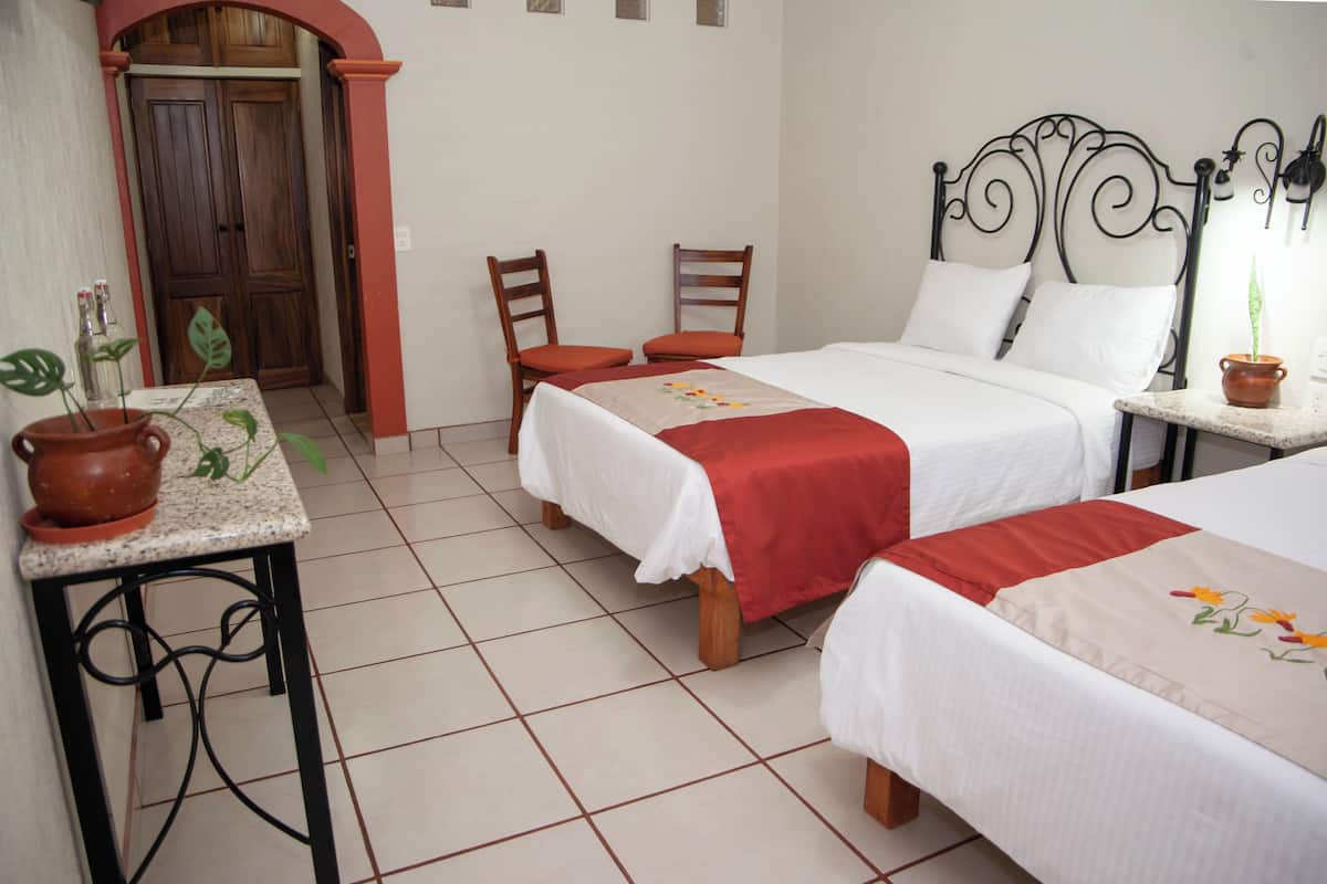 Deluxe Double Room, Courtyard View | Desk, laptop workspace, free WiFi