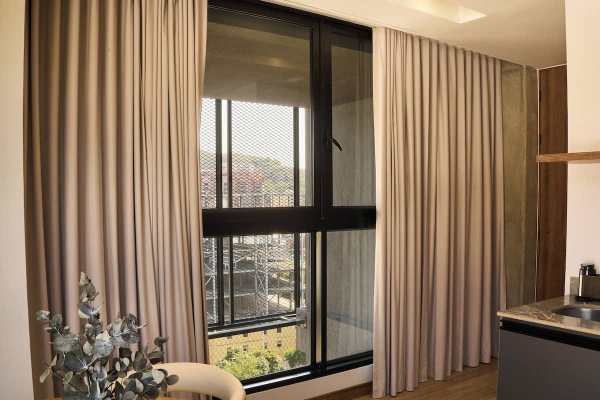 Standard Studio Suite, Non Smoking, Kitchen | In-room safe, laptop workspace, soundproofing, iron/ironing board