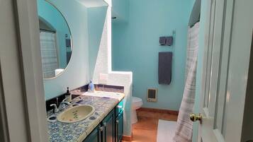 Hair dryer, towels, soap, shampoo