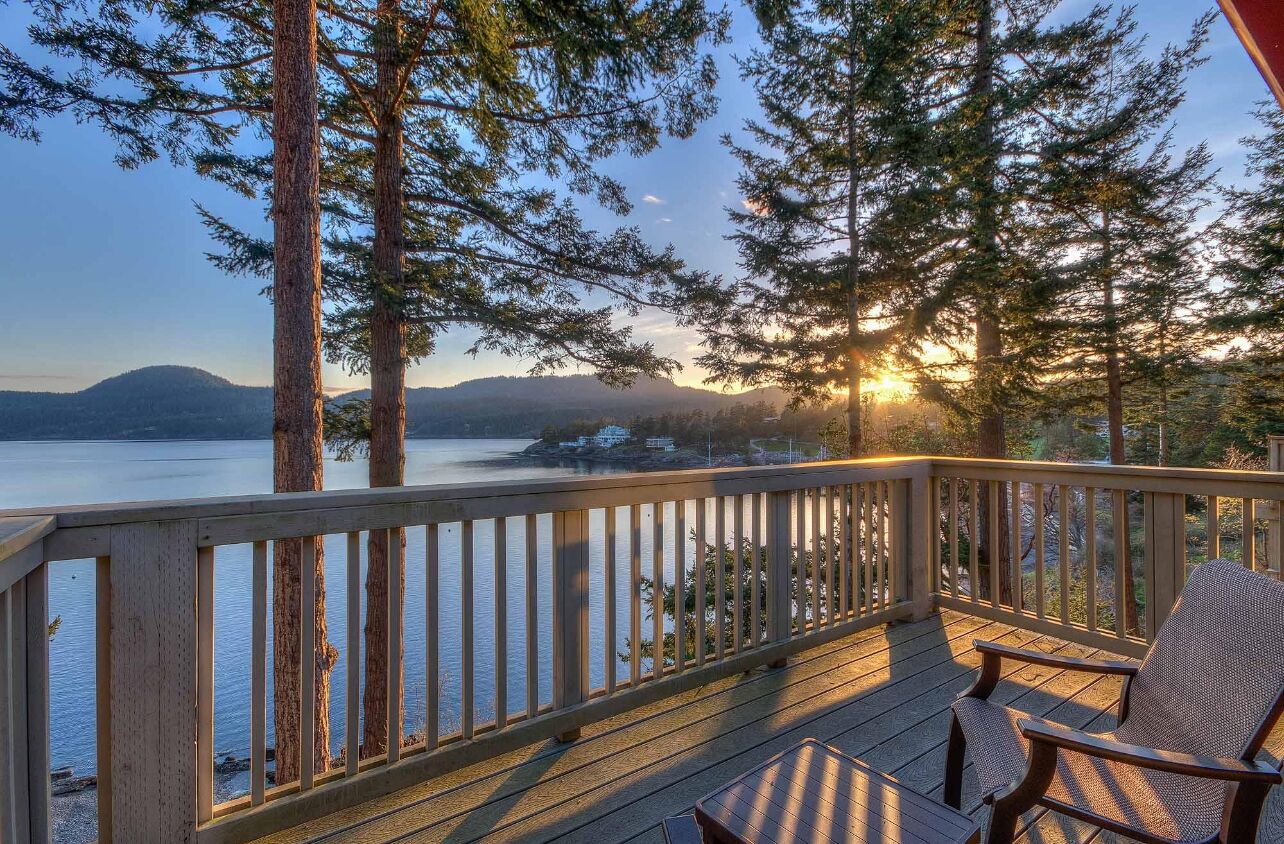 Habitación familiar, 2 camas Queen size, vista al puerto, frente al océano | Terraza o patio