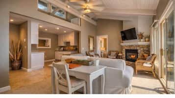 Deluxe Suite, 2 Bedrooms, Kitchen, Partial Ocean View | Living room | 40-inch Smart TV with digital channels