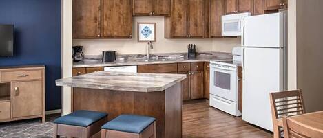 Fridge, microwave, stovetop, coffee/tea maker