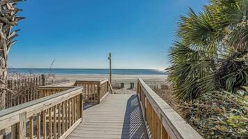 On the beach, sun-loungers, beach towels