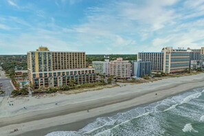 On the beach, sun loungers, beach towels - Adorable Ocean Front Condo - Pet friendly (Myrtle Beach)