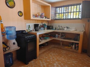 Fridge, stovetop, coffee/tea maker, electric kettle