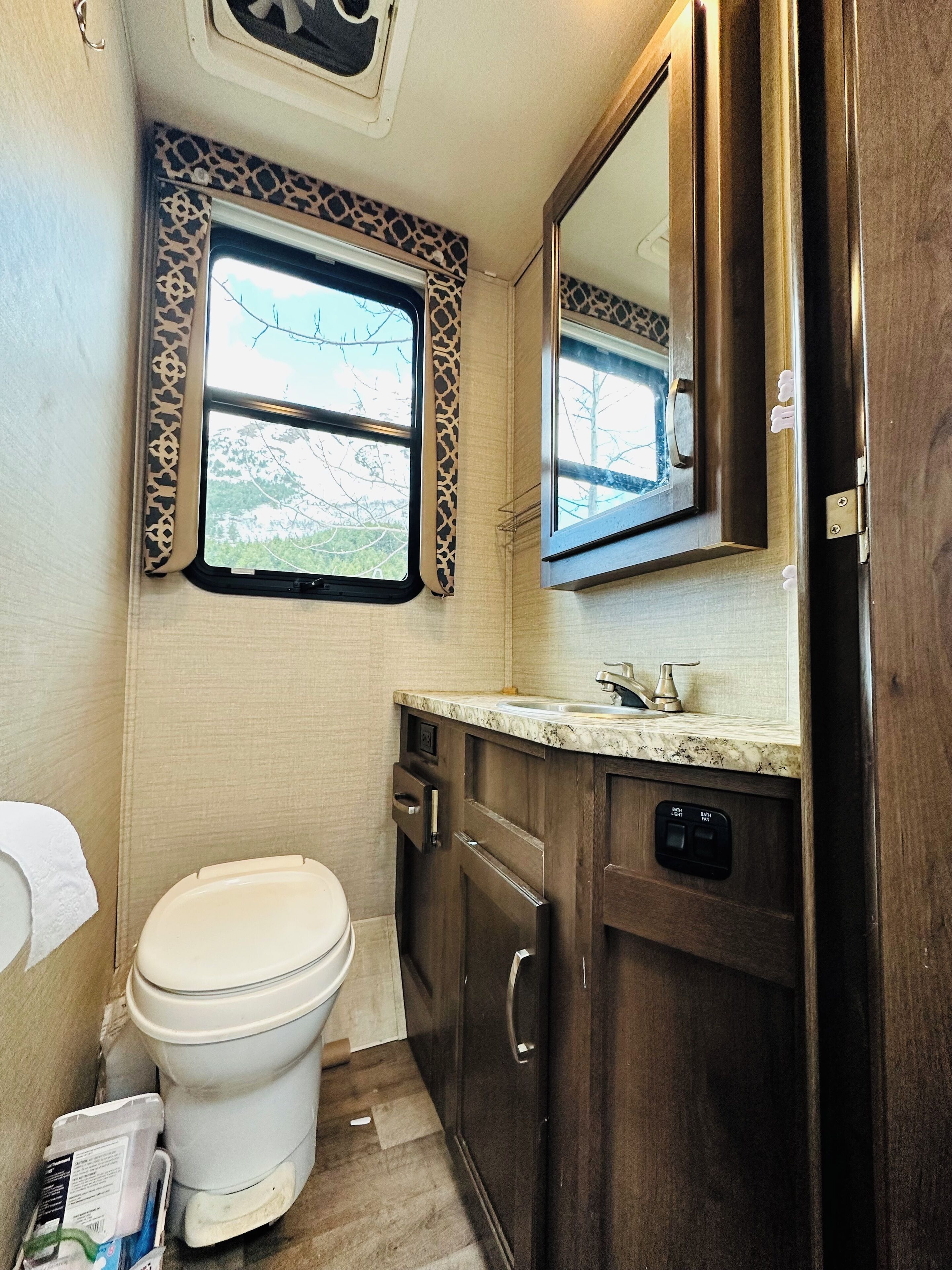 Shower, towels, soap, toilet paper