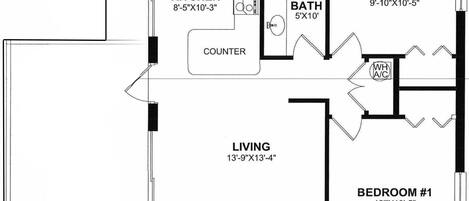 A floor plan with a kitchen, two bedrooms, a bathroom, and a living area.