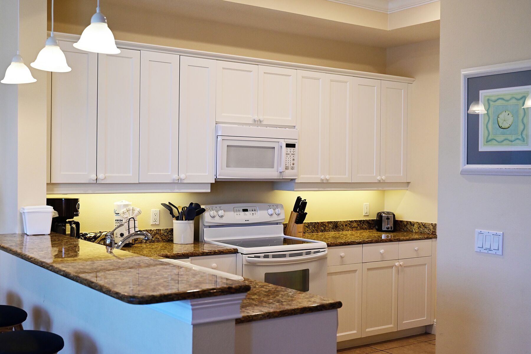 Coffee/tea maker, fridge, microwave, toaster