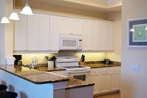 Coffee/tea maker, fridge, microwave, toaster