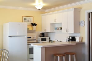 Coffee/tea maker, fridge, microwave, toaster