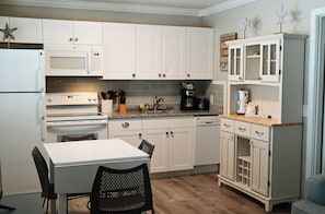 Coffee/tea maker, fridge, microwave, toaster