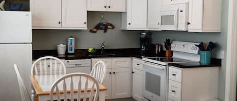 Coffee/tea maker, fridge, microwave, toaster