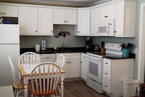 Coffee/tea maker, fridge, microwave, toaster