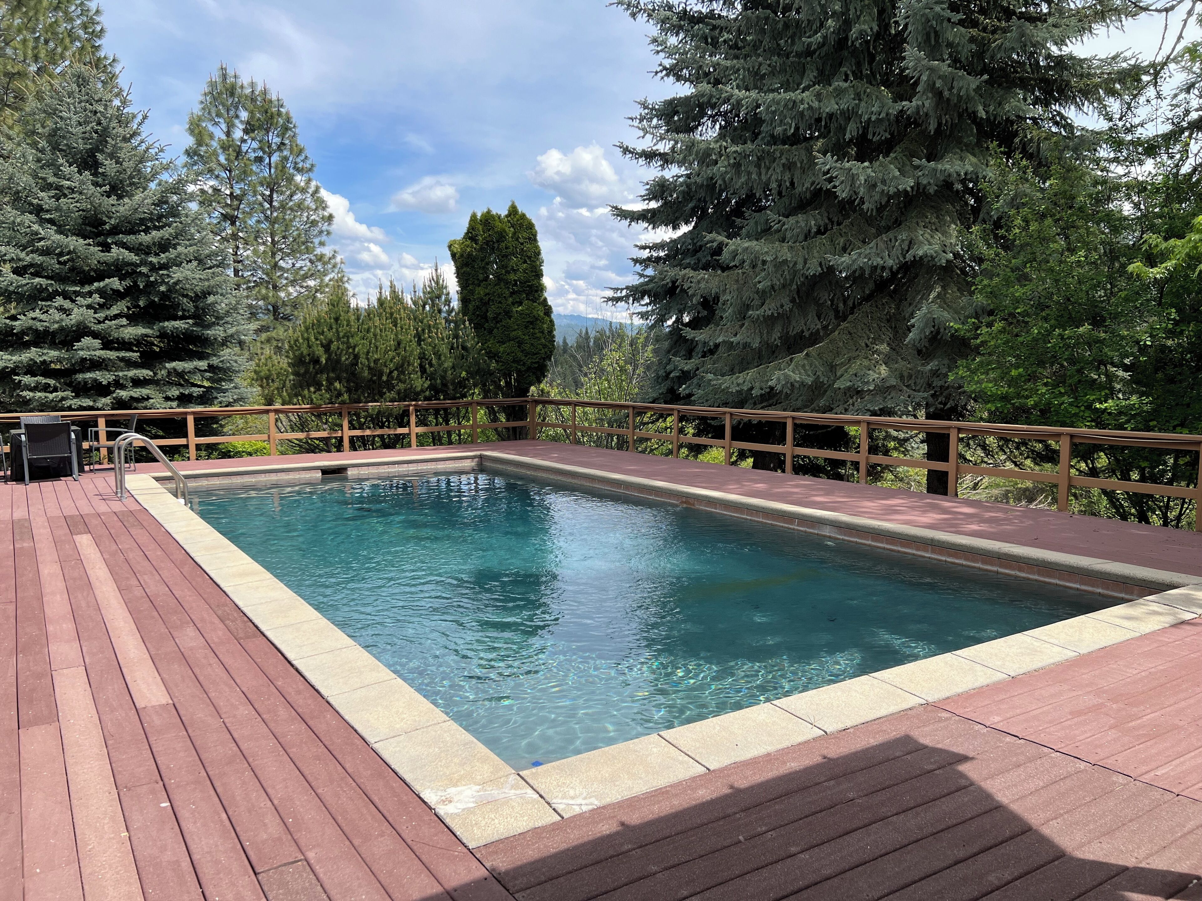 Unwind in our geothermal pool retreat!  Frepit, horseshoe pits, sleeps 10, and WiFi.