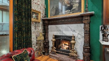Exclusive Room | Living area | 70-inch Smart TV with digital channels, fireplace