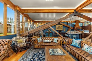 Exclusive Penthouse, River View | Living area | 70-inch Smart TV with digital channels, fireplace - Thistledown on Oak (Hood River)