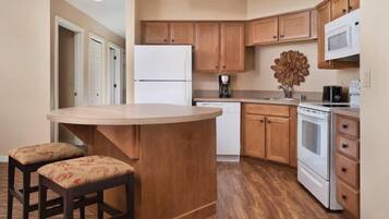 Fridge, microwave, stovetop, coffee/tea maker