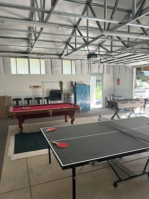 Games room - Cabin on the Creek, with fireplace, game room, fenced-in yard  and firepit. (Rye)
