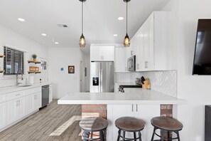 Full-sized fridge, microwave, coffee/tea maker, spices