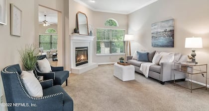 Four-bedroom mini estate, minutes from downtown Jax with a sunroom and backyard