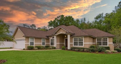 Four-bedroom mini estate, minutes from downtown Jax with a sunroom and backyard