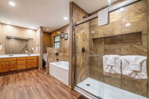 Shower, jetted tub, towels