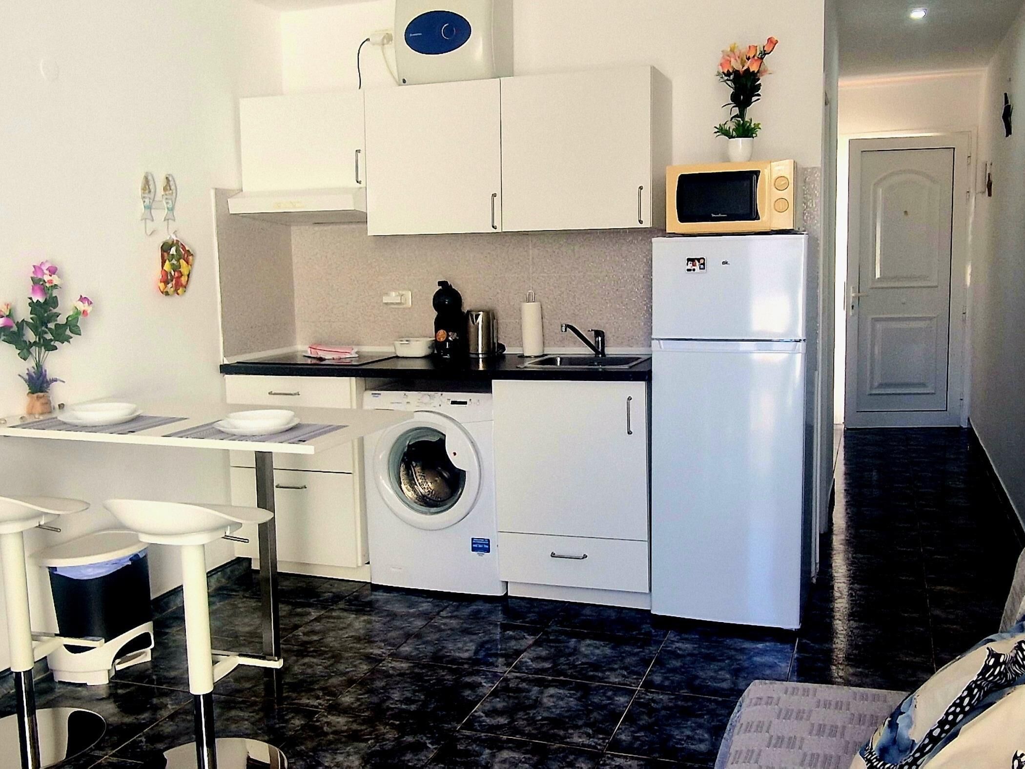 Fridge, microwave, coffee/tea maker, toaster