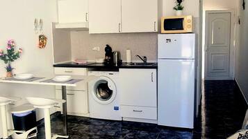 Fridge, microwave, coffee/tea maker, toaster