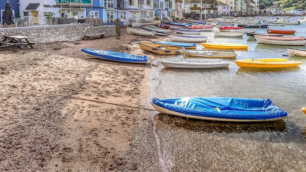 A coastal town with colorful buildings and a sandy beach with boats. - Haldon View in Bishopsteignton (Teignmouth)