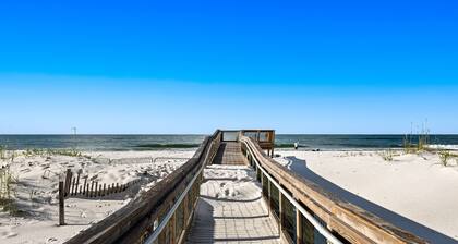 Gulf-view condo with pool, hot tub, beach access, tennis, balcony, AC, & W/D