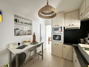 Fridge, microwave, cookware/dishes/utensils