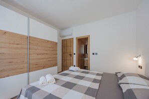 2 quartos, Wi-Fi de cortesia, roupa de cama