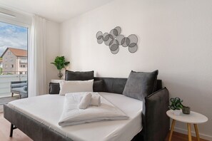1 habitación, tabla de planchar con plancha, wifi gratis y ropa de cama 
