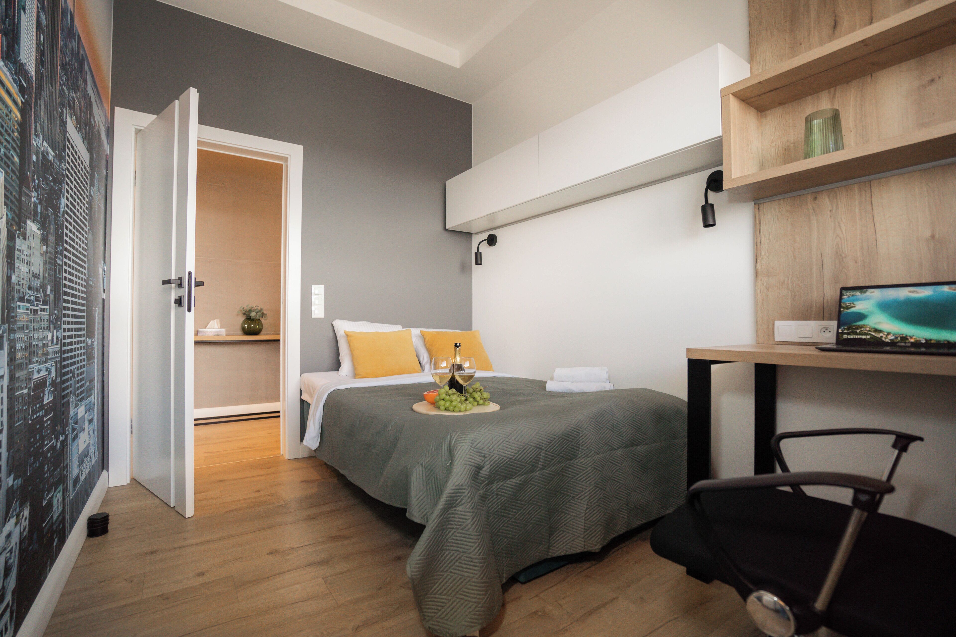 デラックス アパートメント シティビュー | 2 室のベッドルーム、デスク、遮光カーテン、アイロン / アイロン台