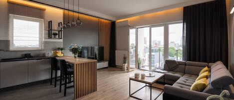 Appartement Deluxe, vue ville | Coin séjour