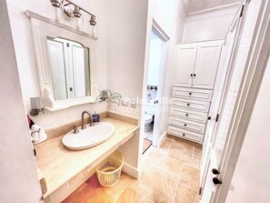 Hair dryer, towels, soap, toilet paper
