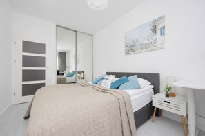 Apartment, 1 Bedroom, Balcony | 1 bedroom, desk, laptop workspace, bed sheets - Burakowska 16 Apartment by Renters (Warsaw)