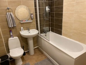 Hair dryer, towels, soap, shampoo