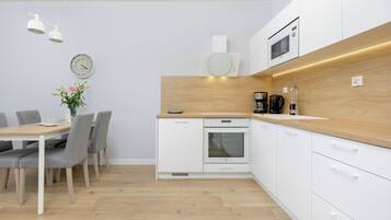 Apartment, 1 Bedroom, Balcony | Private kitchen | Fridge, microwave, oven, stovetop