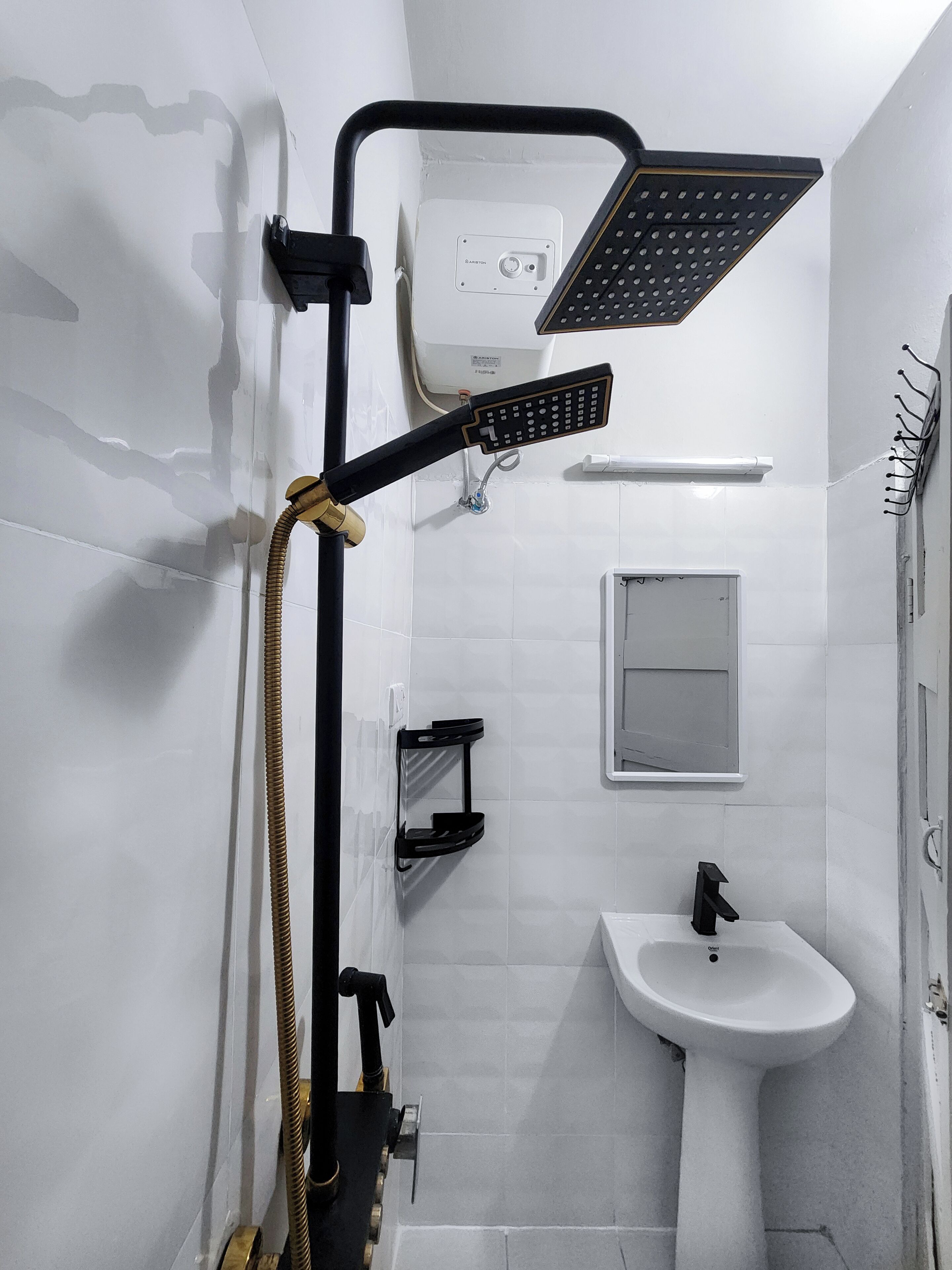 Shower, towels, soap, toilet paper