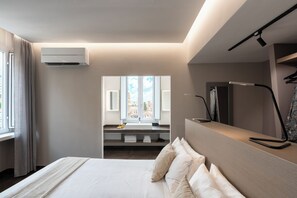Rom – superior, byutsikt | Dundyner, minibar, safe på rommet og skrivebord