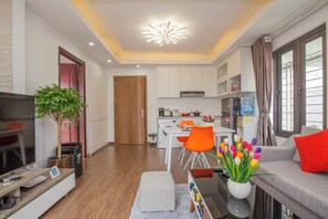 Business Apartment, Courtyard View | Living area | 55-inch TV with cable channels, fireplace, heated floors - Sumitomo 2 - 12 Dao Tan (Hanoi)