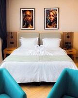Suite Deluxe | Caja fuerte, wifi gratis, ropa de cama