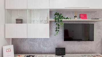 Apartamento | Área de estar | TV 35 polegadas com canais digitais